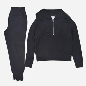 Varley black half zip sweatshirt and jogger set Two side & back pockets
